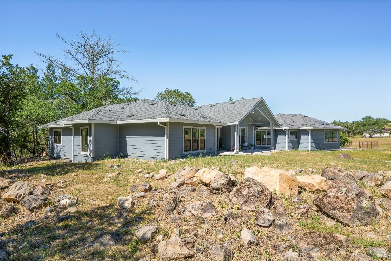 4665 Upper Ridge Road Santa Rosa, CA 95404 - Photo 61 of 71 a front view of a house with a yard