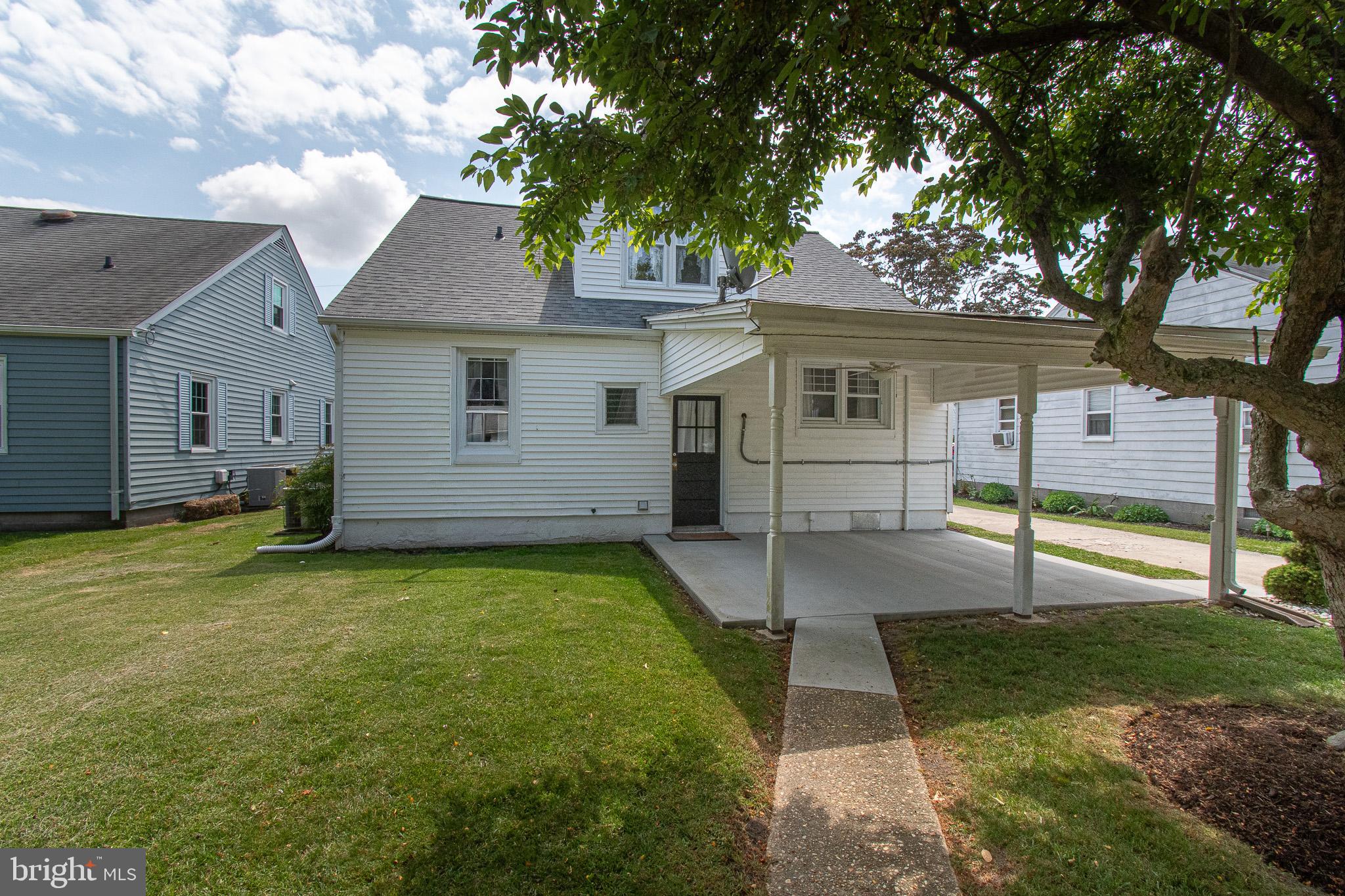 207 Crusader Road Cambridge, MD 21613 - Photo 70 of 76 a house view with a garden space