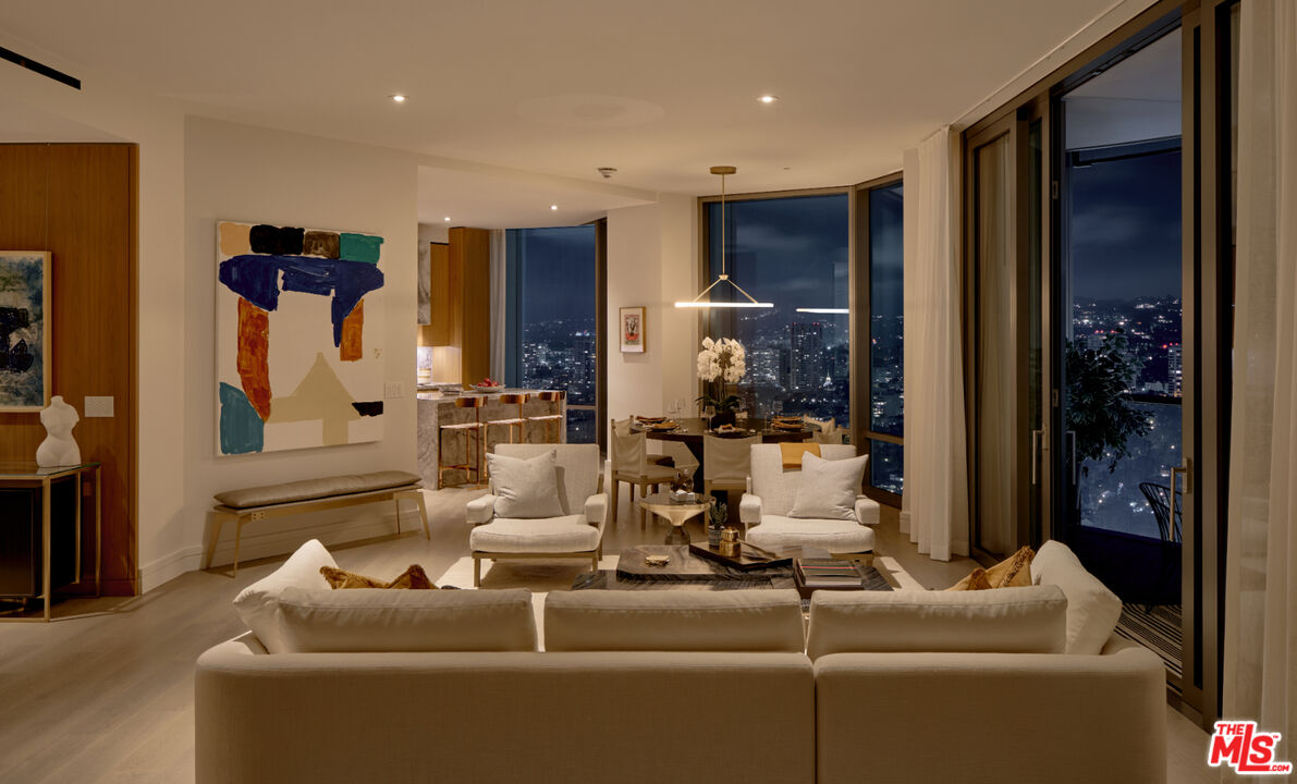 211 Elm Court, Unit 39A Los Angeles, CA 90067 - Photo 15 of 30 a living room with furniture and a large window