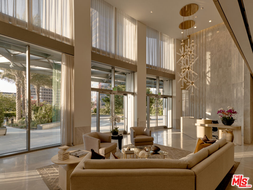 211 Elm Court, Unit 39A Los Angeles, CA 90067 - Photo 19 of 30 a living room with furniture and a large window