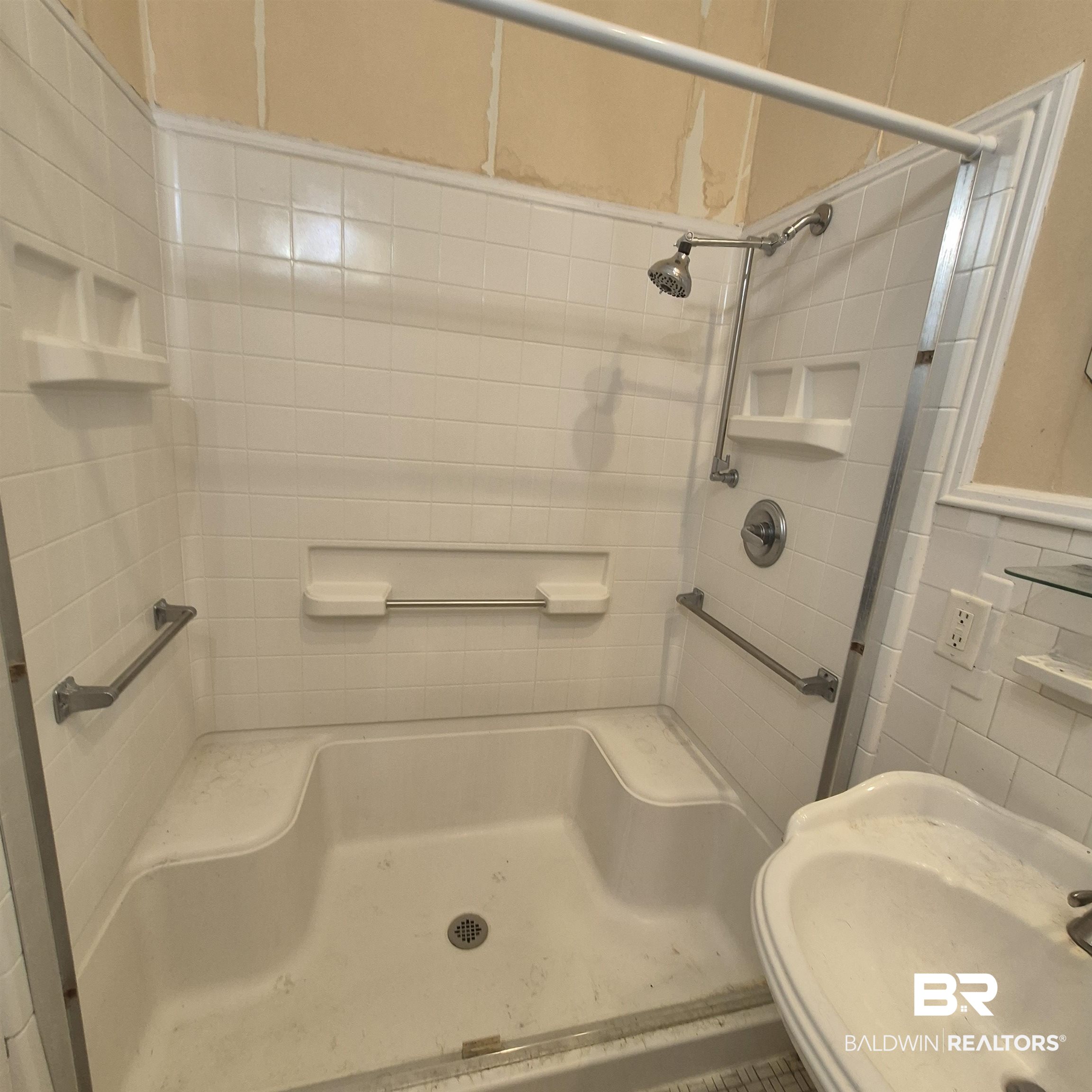 308 Rural Street Evergreen, AL 36401 - Photo 27 of 40 Bathroom with a walk in shower and tile walls