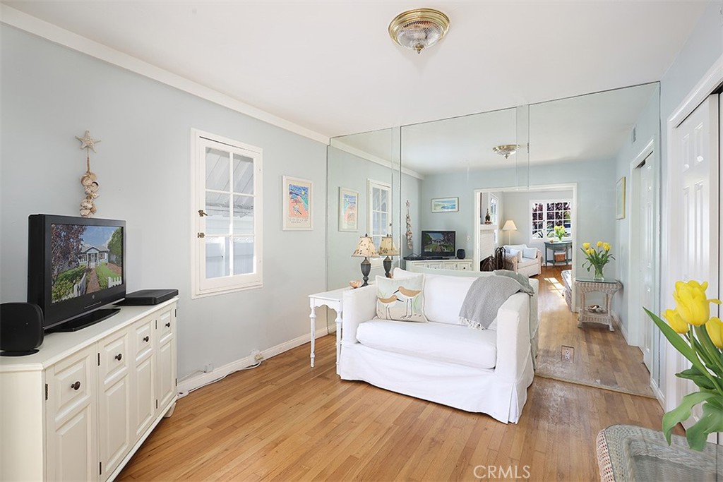 432 Shadow Lane Laguna Beach, CA 92651 - Photo 12 of 22 a living room with furniture a flat screen tv and a window