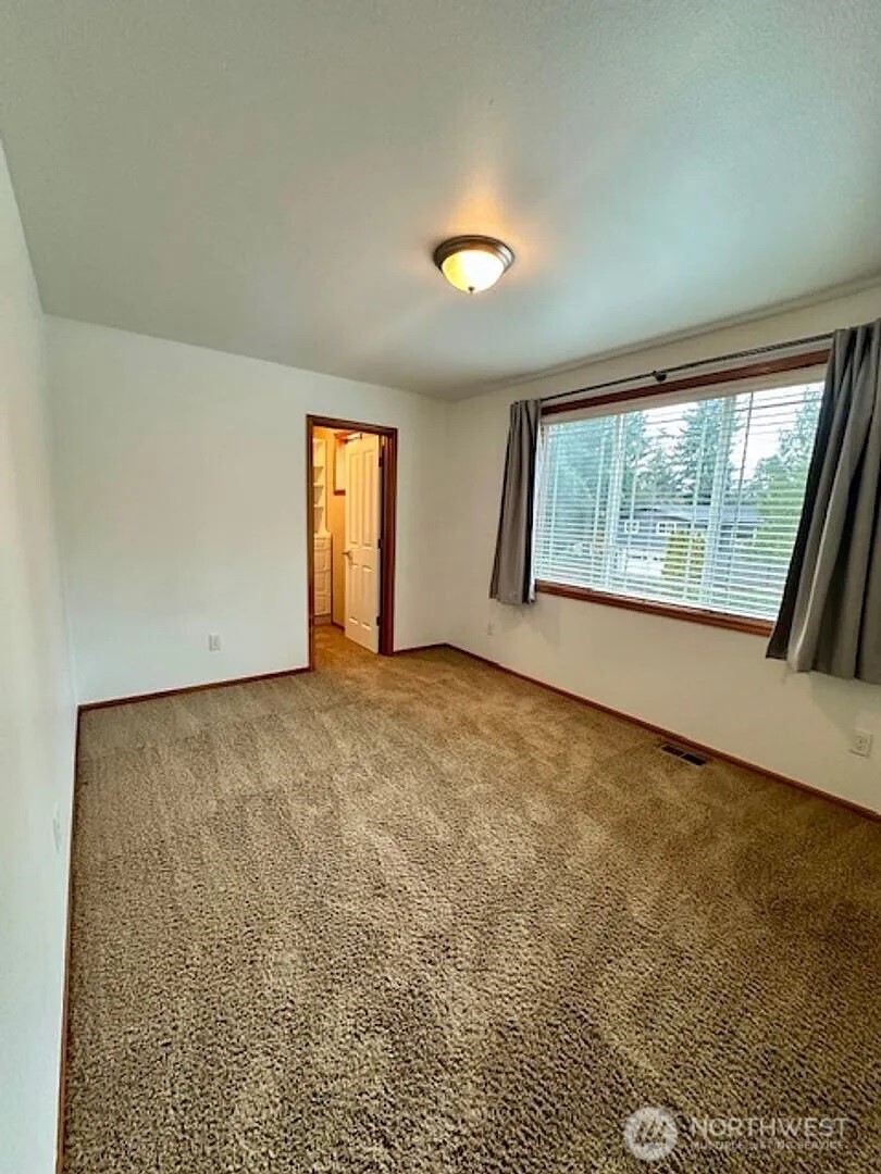 2013 Northeast 27th Street Renton, WA 98056 - Photo 12 of 25 an empty room with windows