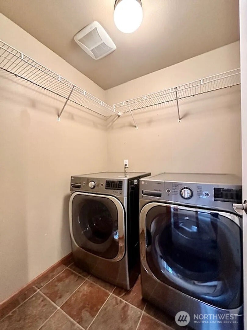 2013 Northeast 27th Street Renton, WA 98056 - Photo 16 of 25 a utility room with dryer and washer