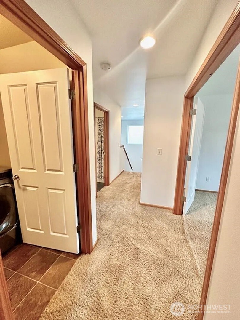 2013 Northeast 27th Street Renton, WA 98056 - Photo 19 of 25 a view of a hallway with closet