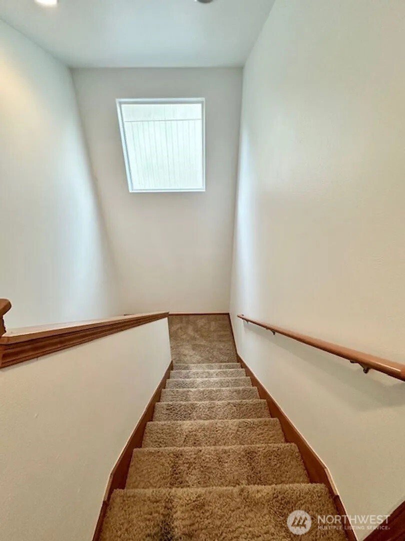 2013 Northeast 27th Street Renton, WA 98056 - Photo 9 of 25 a view of a hallway with wooden floor