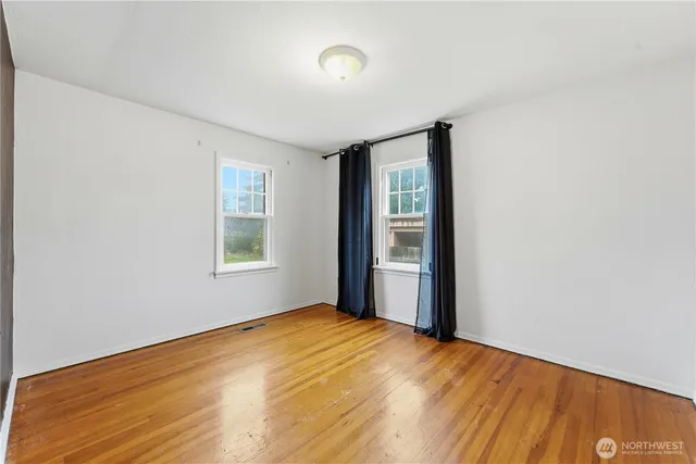 a view of empty room with front door