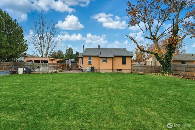 a view of a house with a big yard
