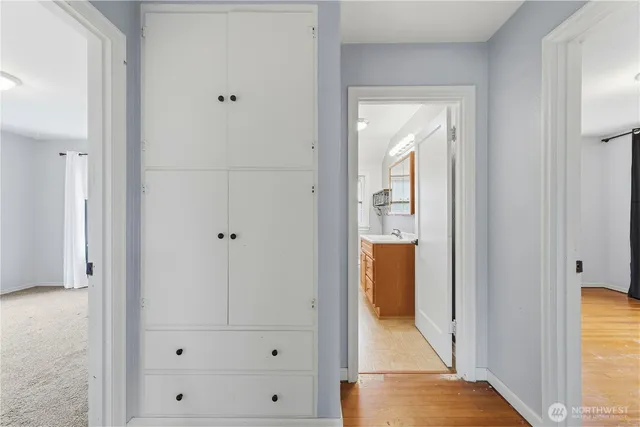 a view of a bathroom from a hallway