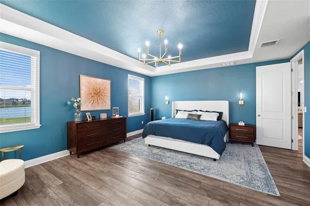 a bathroom with a sink double vanity granite tub and shower