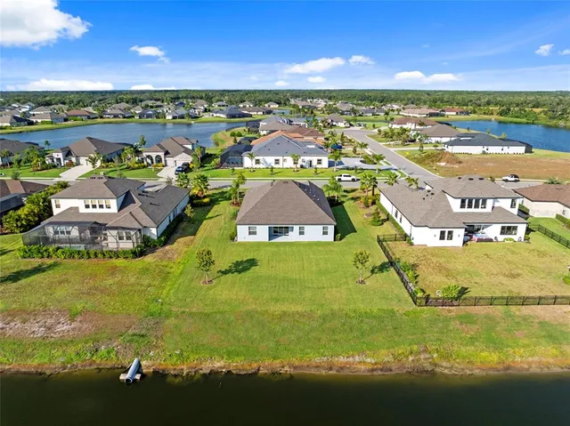 a view of a park with large trees