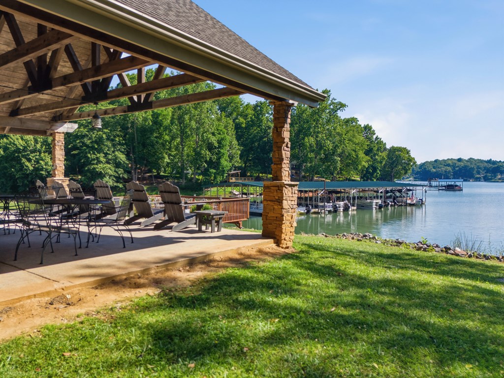 2143 Ridgecrest Circle, Unit 1 Hiawassee, GA 30546 - Photo 53 of 53 a swimming pool with outdoor seating and yard