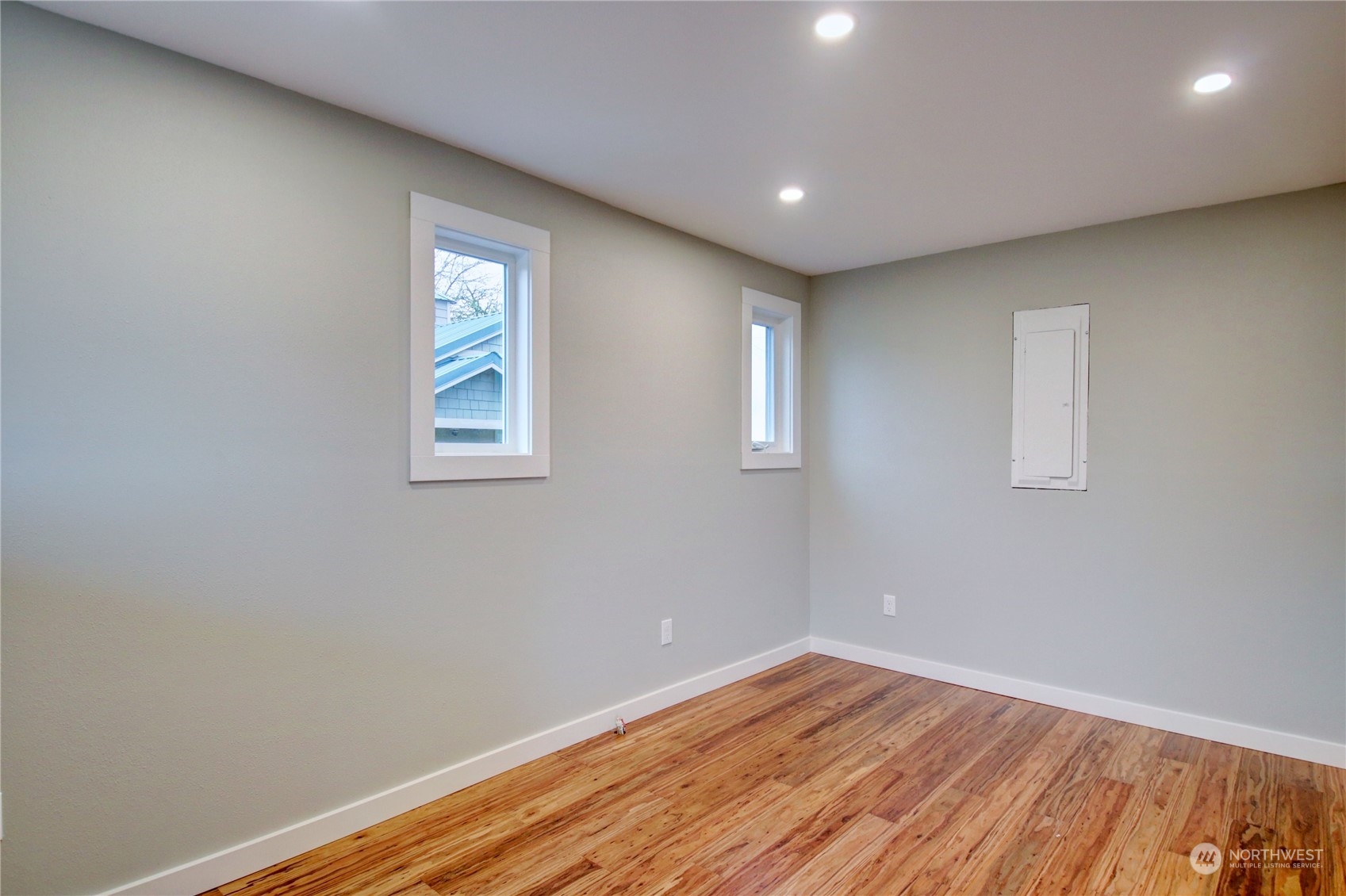 16614 Dunbar Road Mount Vernon, WA 98273 - Photo 16 of 40 a view of empty room with wooden floor and fan