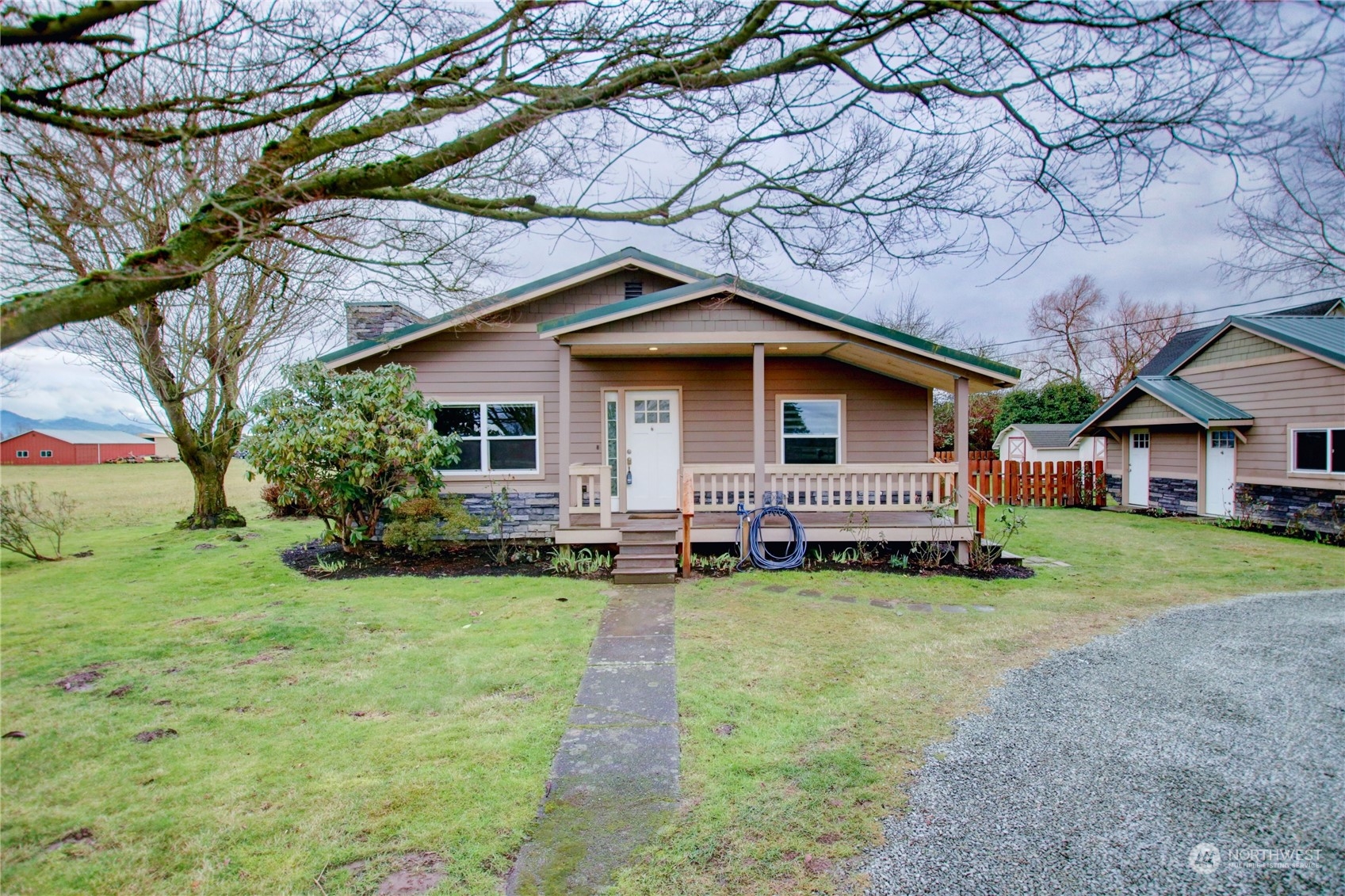 16614 Dunbar Road Mount Vernon, WA 98273 - Photo 2 of 40 a front view of a house with garden