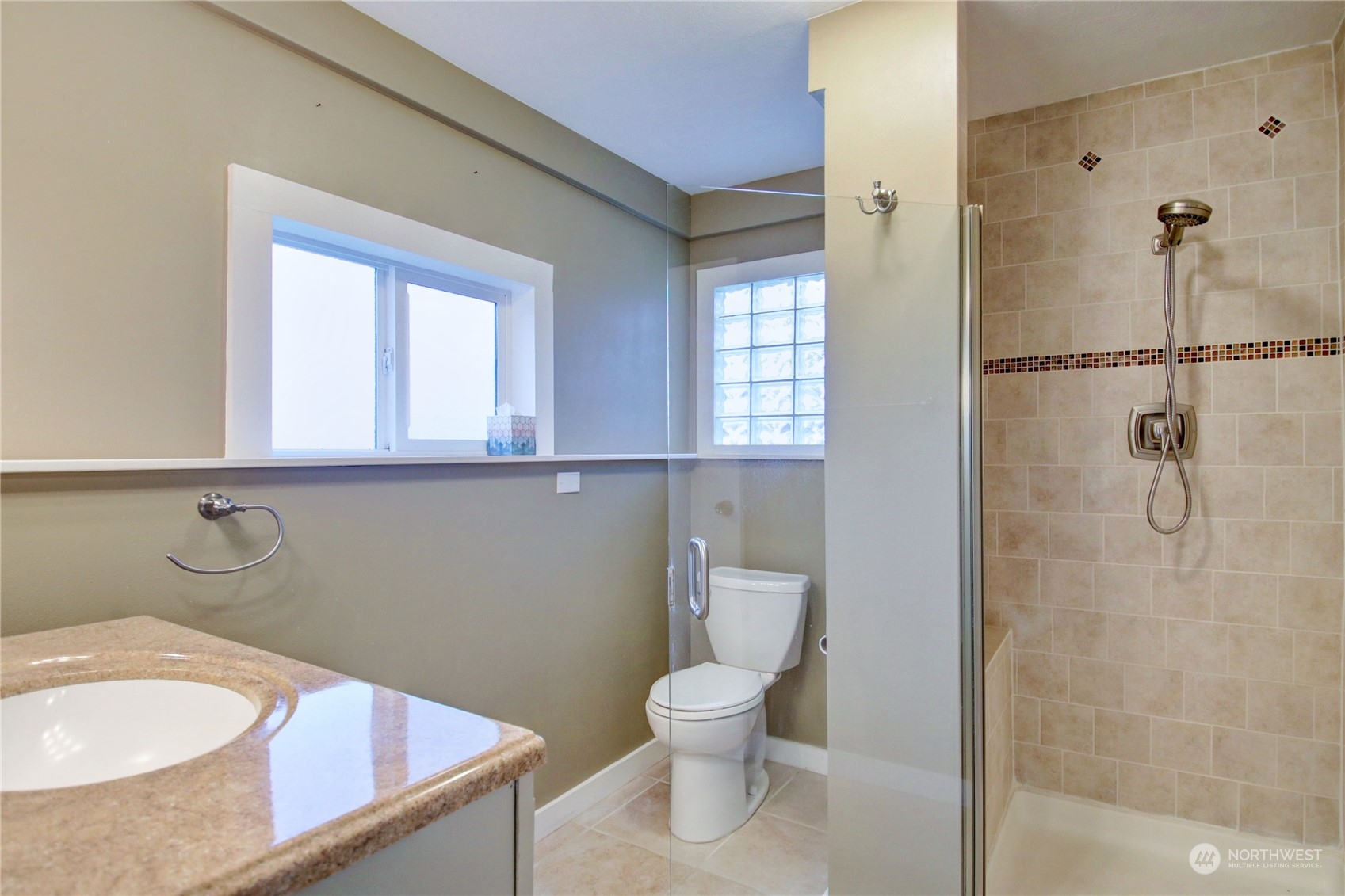 16614 Dunbar Road Mount Vernon, WA 98273 - Photo 26 of 40 a bathroom with a sink a toilet and shower