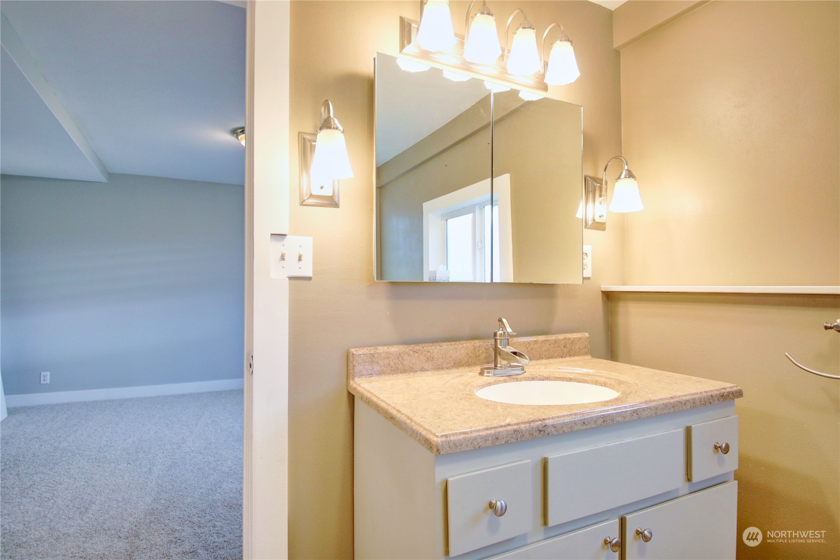 16614 Dunbar Road Mount Vernon, WA 98273 - Photo 27 of 40 a bathroom with a sink and a mirror