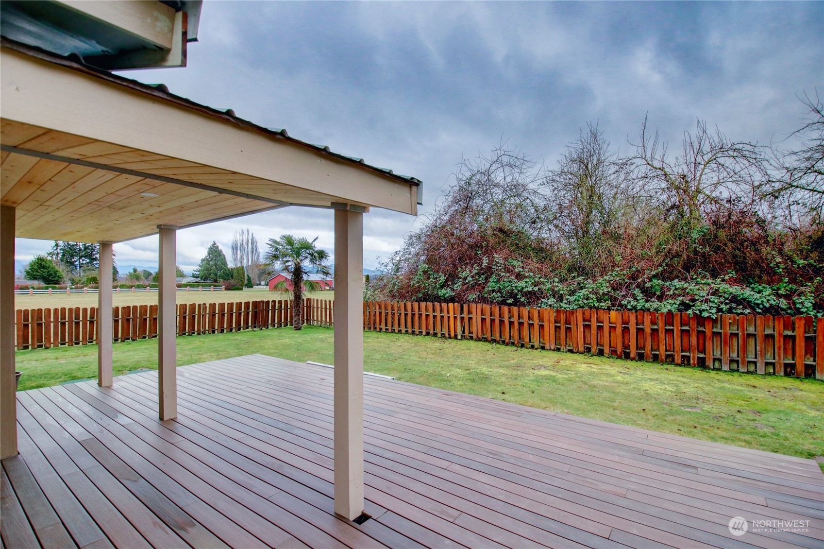 16614 Dunbar Road Mount Vernon, WA 98273 - Photo 29 of 40 a view of a deck with a big yard