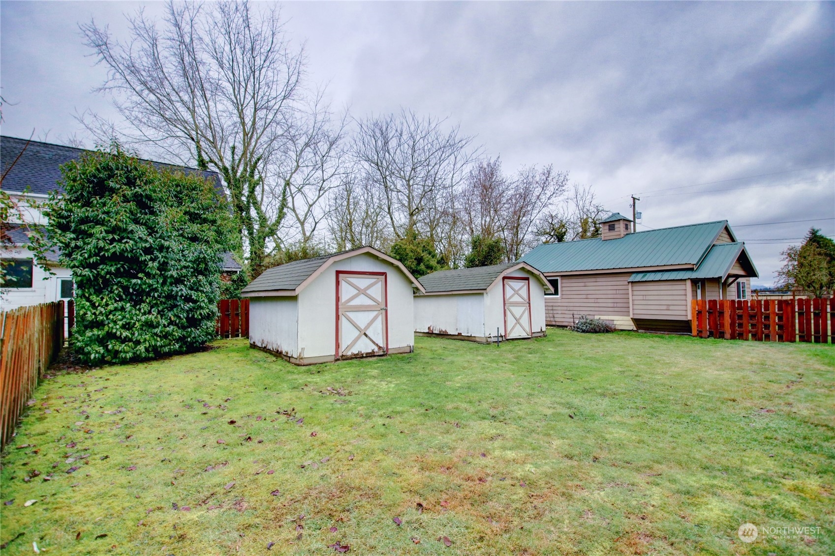 16614 Dunbar Road Mount Vernon, WA 98273 - Photo 32 of 40 a view of a house with a yard and large tree