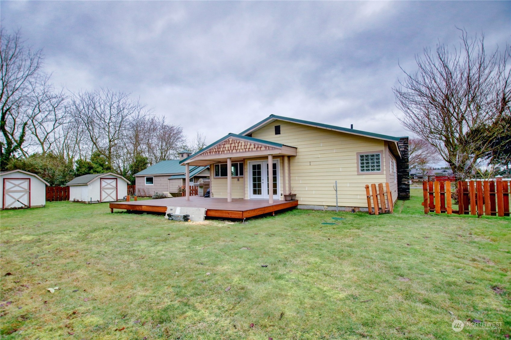 16614 Dunbar Road Mount Vernon, WA 98273 - Photo 36 of 40 a view of a house with a yard and sitting area