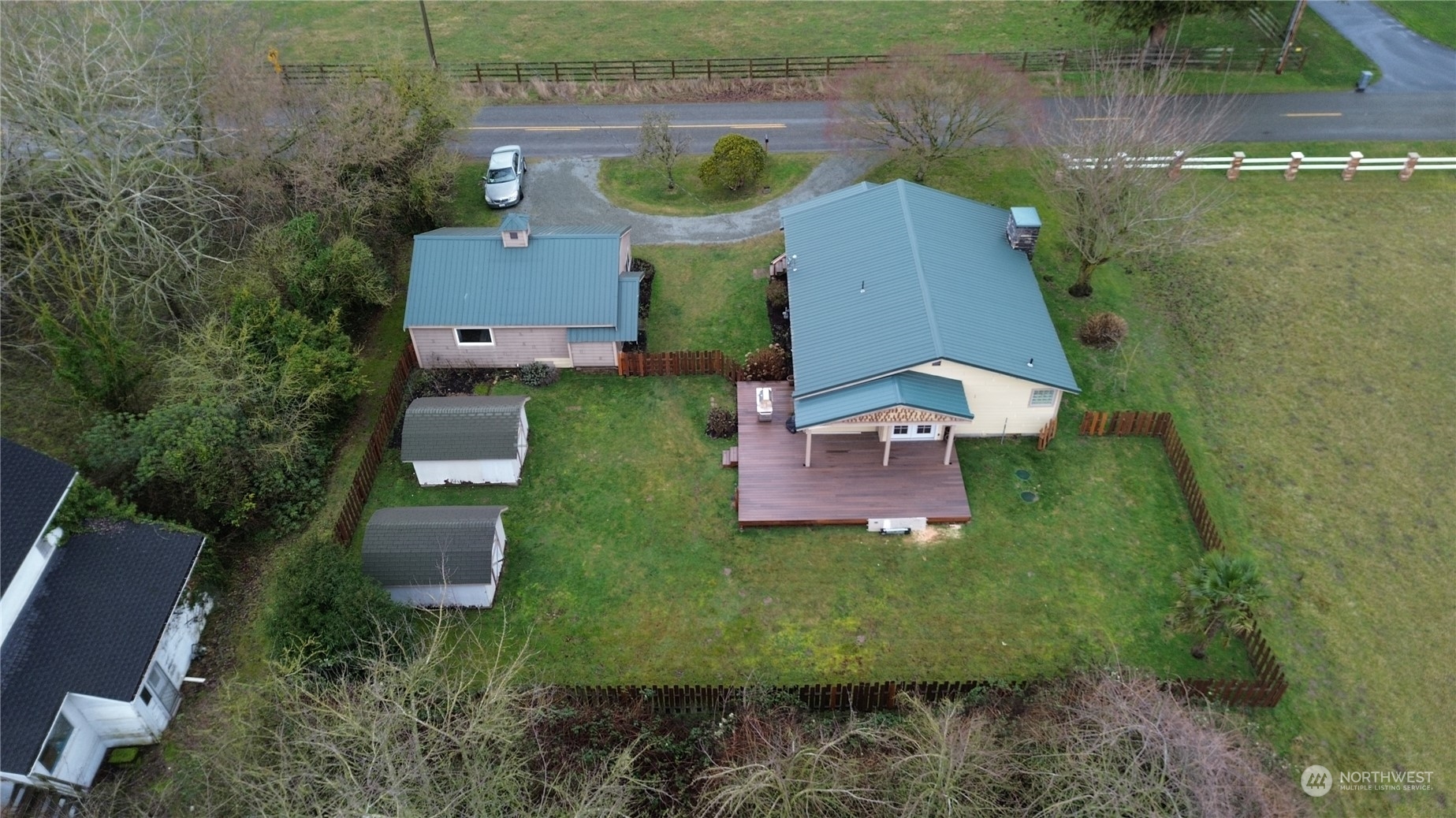 16614 Dunbar Road Mount Vernon, WA 98273 - Photo 37 of 40 an aerial view of a house with garden space and street view