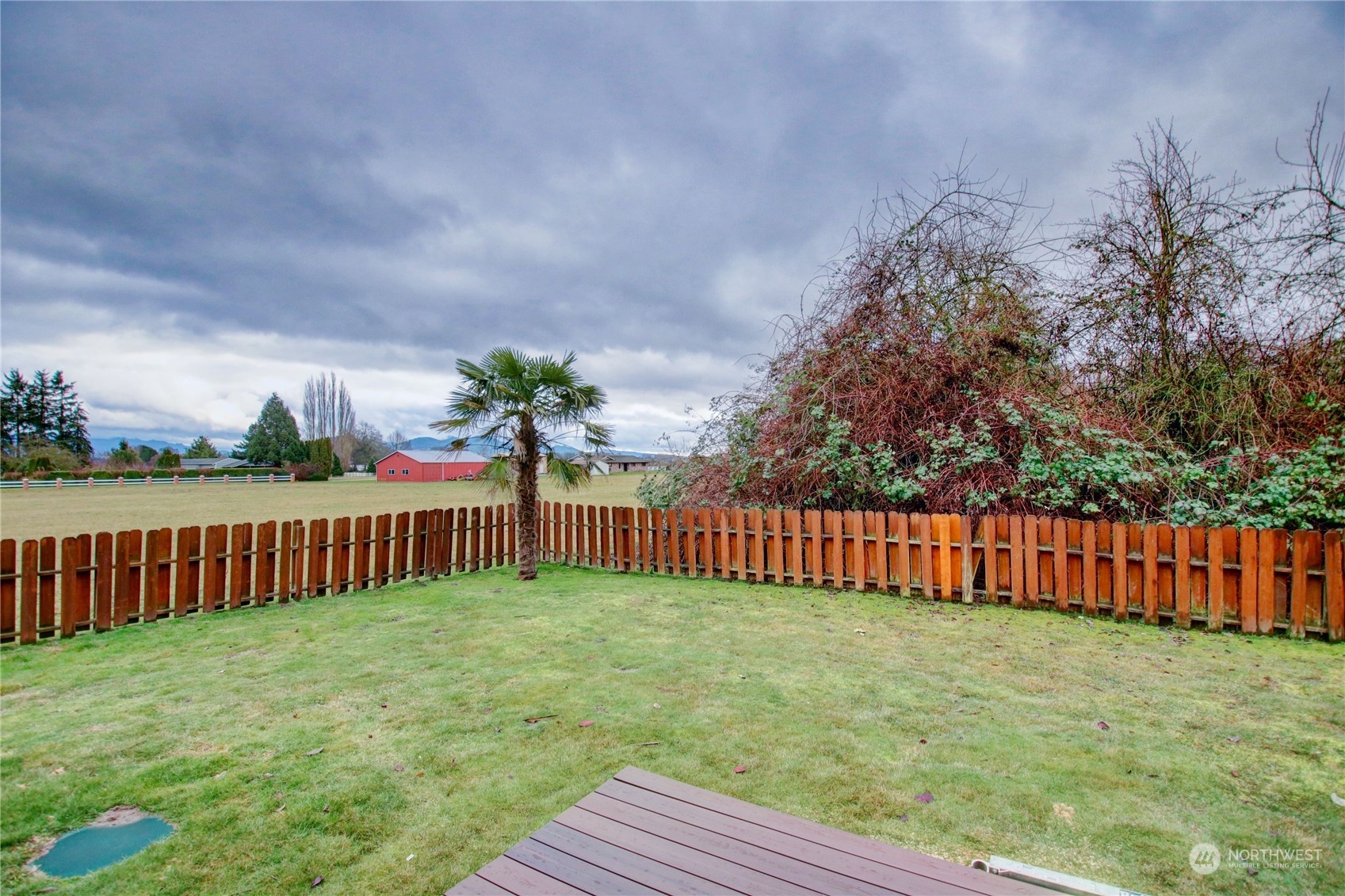 16614 Dunbar Road Mount Vernon, WA 98273 - Photo 38 of 40 a view of a yard with wooden fence