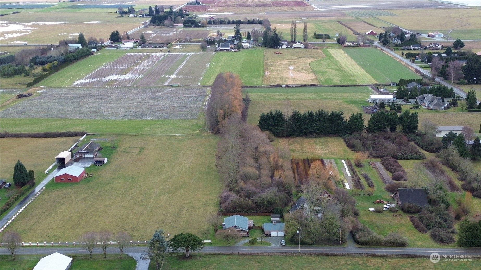 16614 Dunbar Road Mount Vernon, WA 98273 - Photo 40 of 40 an aerial view of a house with a yard and lake view