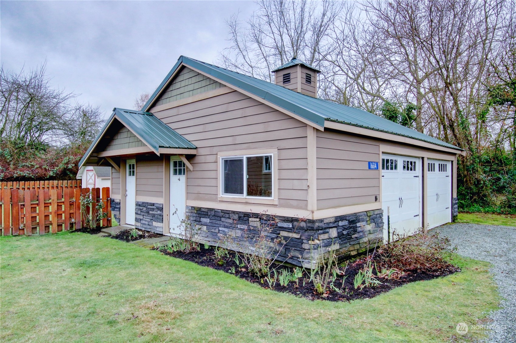 16614 Dunbar Road Mount Vernon, WA 98273 - Photo 4 of 40 a view of a house with a yard and deck