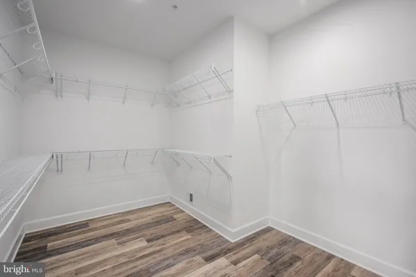 a view of a room with racks on the wall