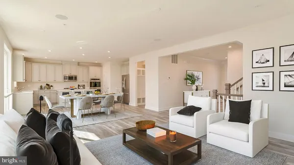 a living room with furniture and a couch