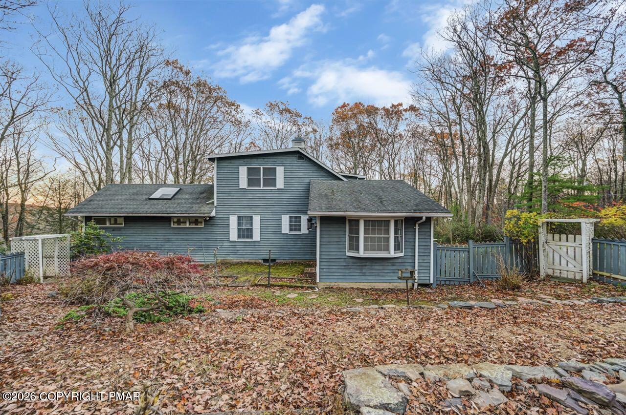 384 Devils Hole Road Cresco, PA 18326 - Photo 4 of 55 a front view of house with a garden