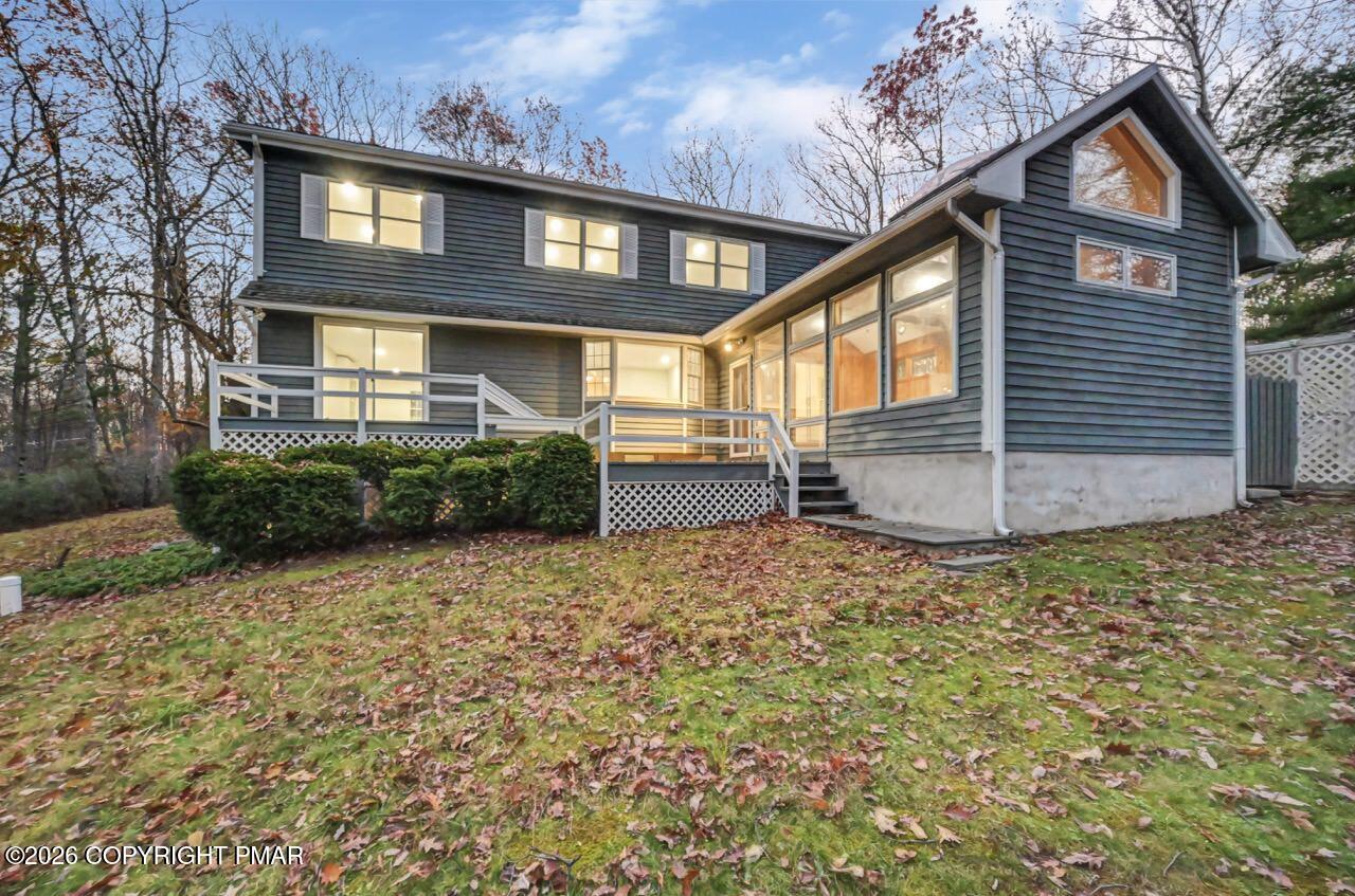 384 Devils Hole Road Cresco, PA 18326 - Photo 53 of 55 a front view of a house with garden