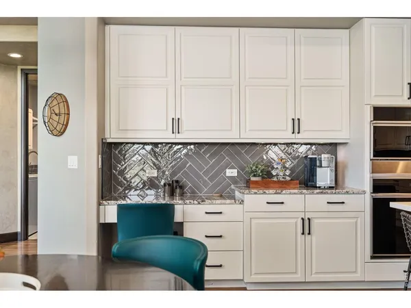 a view of cabinets and window