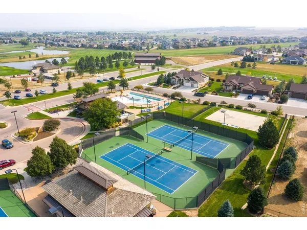 an aerial view of a house with outdoor space