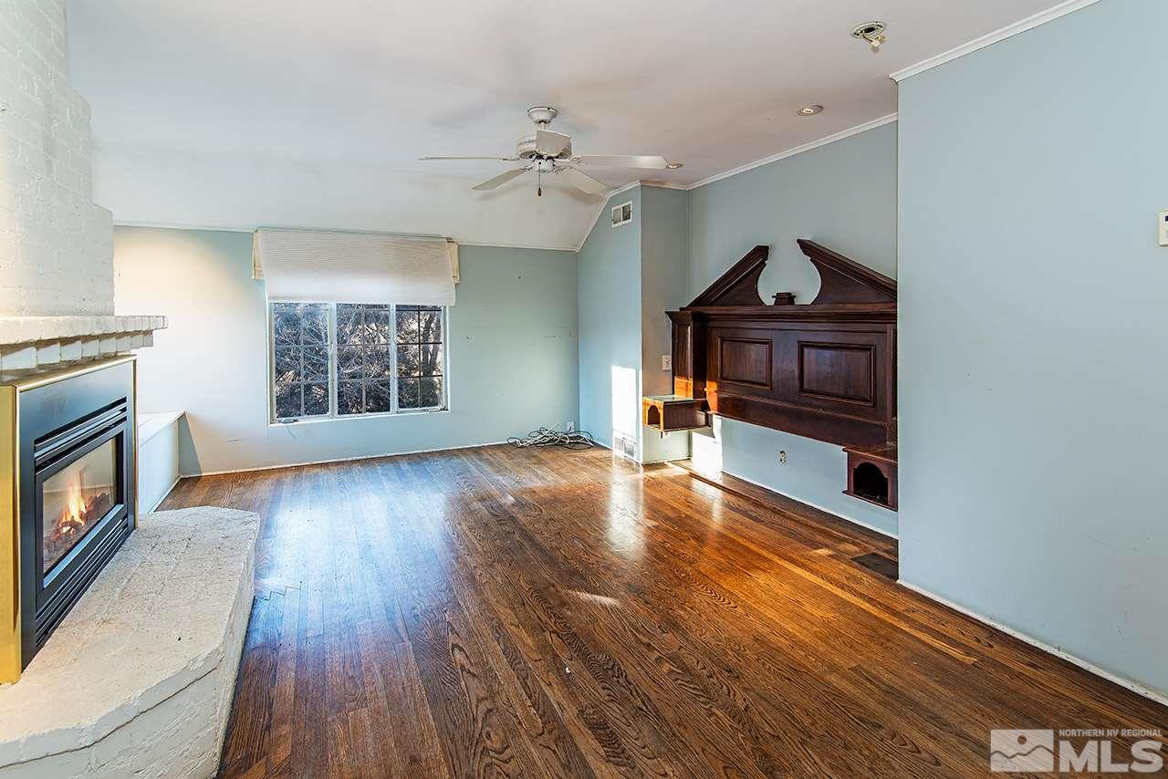 1925 Greenfield Drive Reno, NV 89509 - Photo 21 of 22 wooden floor in an empty room with a window