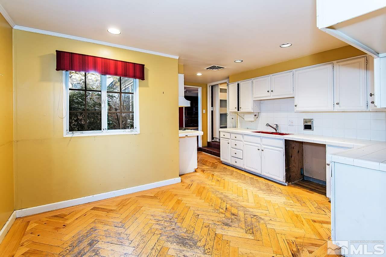 1925 Greenfield Drive Reno, NV 89509 - Photo 6 of 22 a bed room with a bed and window
