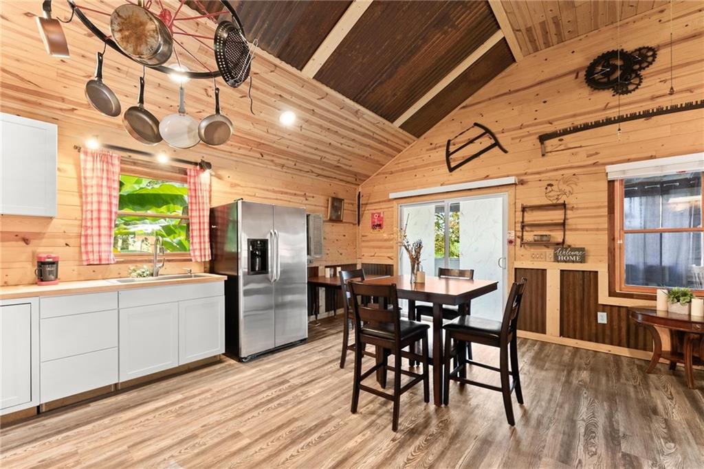 59 Rocket Drive Cleveland, GA 30528 - Photo 11 of 25 a view of a dining room with furniture window and wooden floor