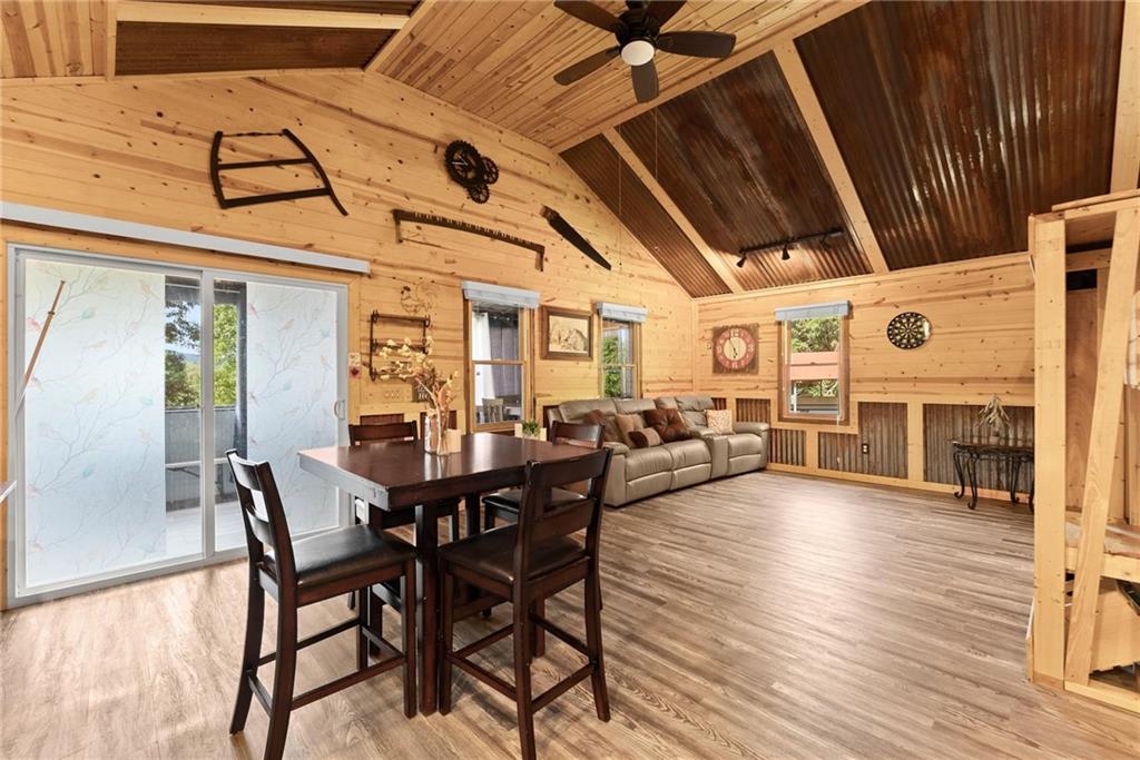 59 Rocket Drive Cleveland, GA 30528 - Photo 13 of 25 a view of a dining room with furniture window and wooden floor