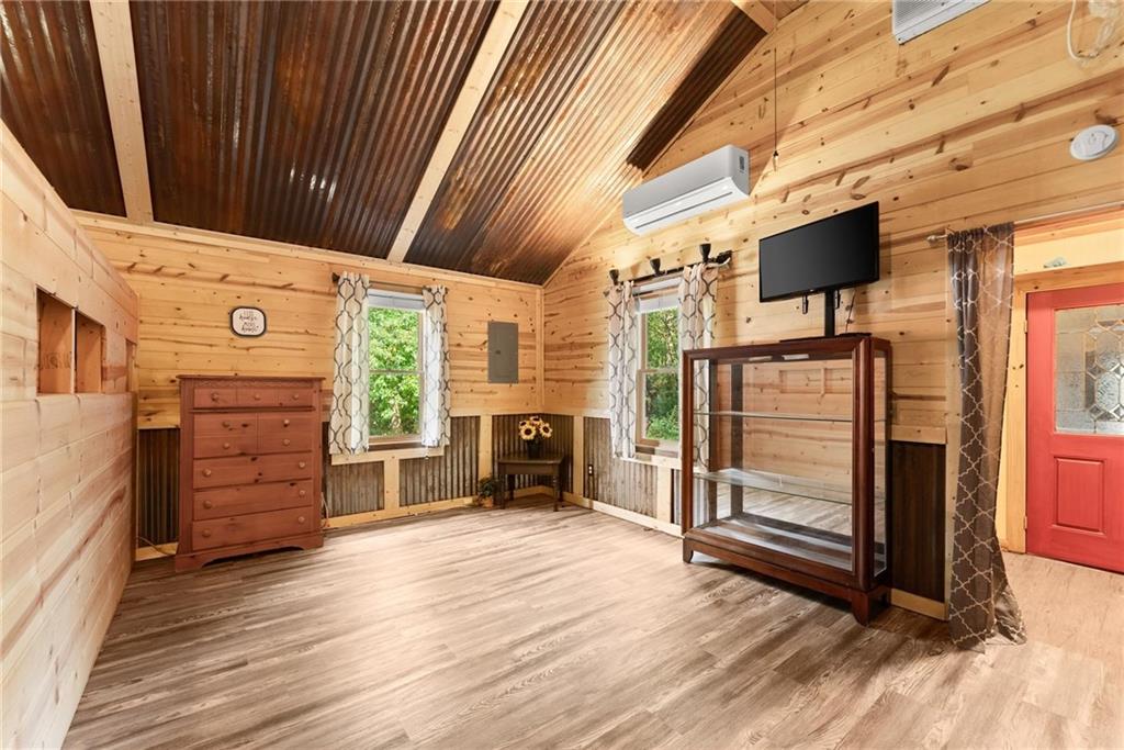 59 Rocket Drive Cleveland, GA 30528 - Photo 14 of 25 a view of a hallway with wooden floor and staircase