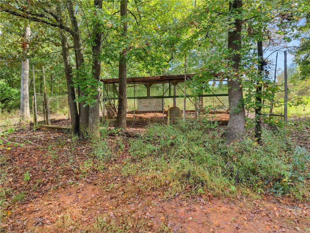 59 Rocket Drive Cleveland, GA 30528 - Photo 22 of 25 a backyard of a house with lots of green space