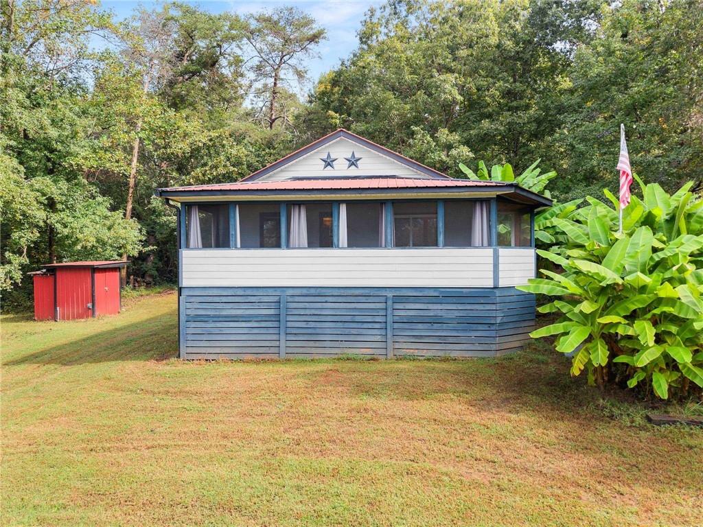 59 Rocket Drive Cleveland, GA 30528 - Photo 3 of 25 a front view of a house with a yard