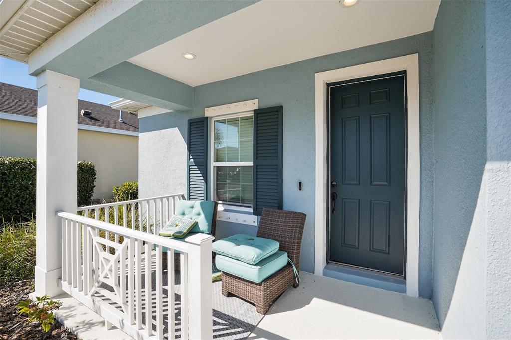 10710 Falling Leaf Court Parrish, FL 34219 - Photo 3 of 50 a view of porch with furniture and deck