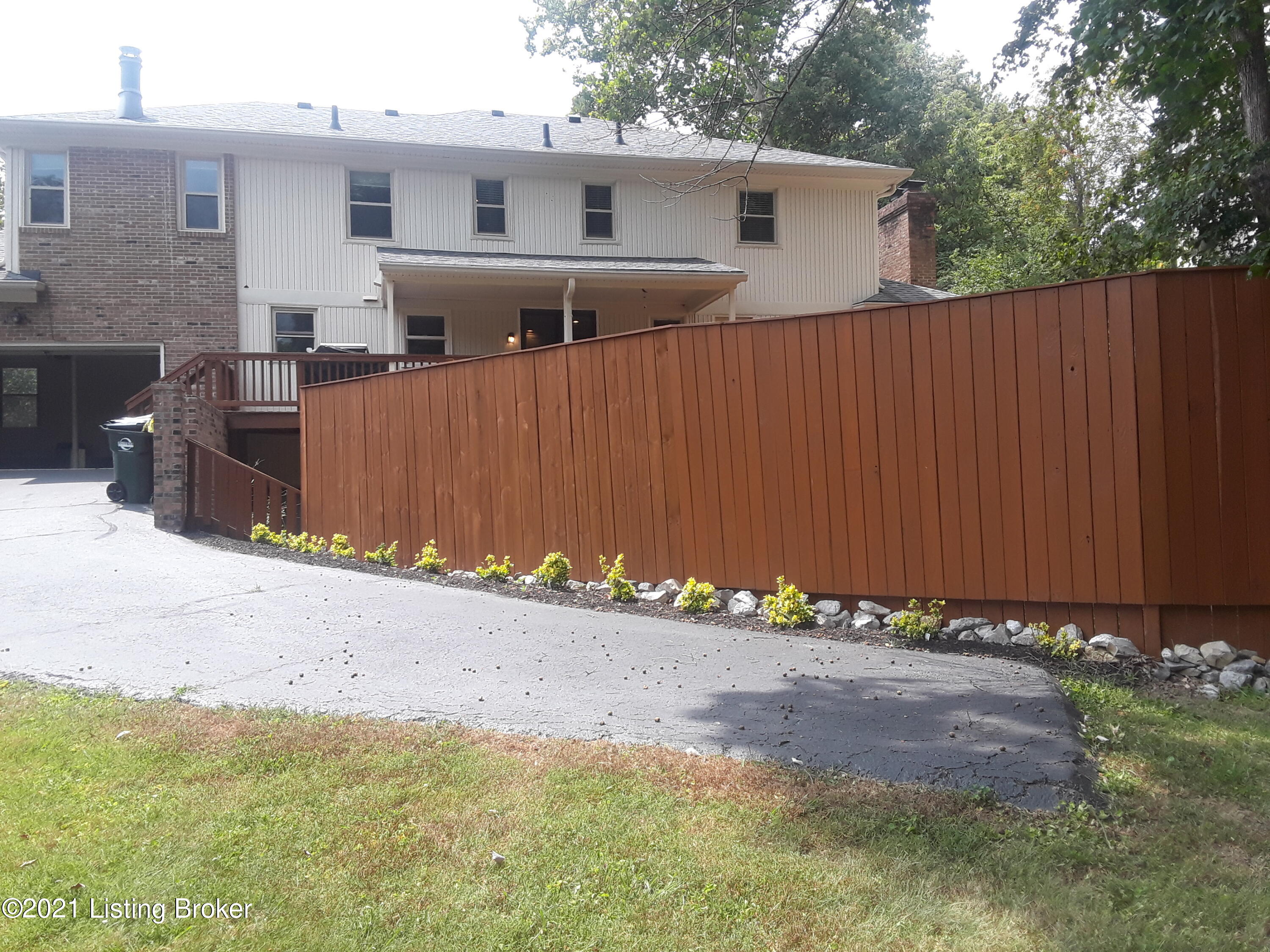 1809 Round Ridge Road Louisville, KY 40207 - Photo 21 of 22 Fence can be removed to open the yard and views. Back portion of driveway can be sodded for more greenspace. Both very easily doable!