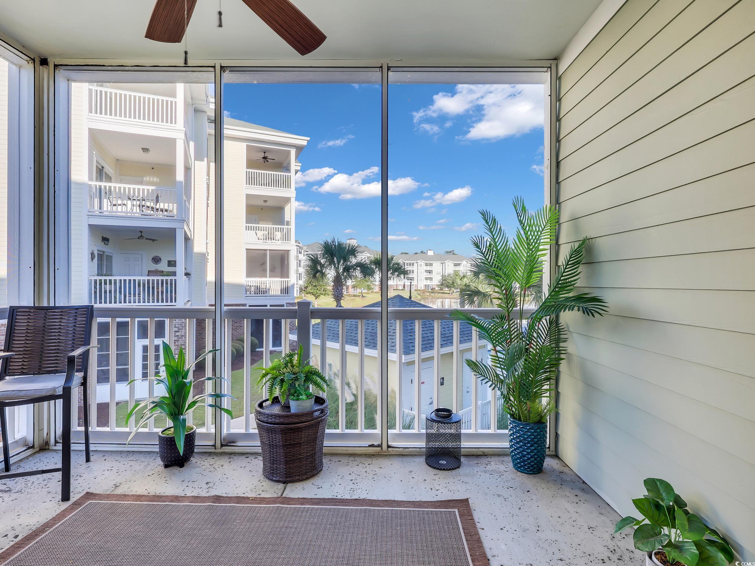 4833 Luster Leaf Circle, Unit 201 Myrtle Beach, SC 29577 - Photo 31 of 39 View of sunroom