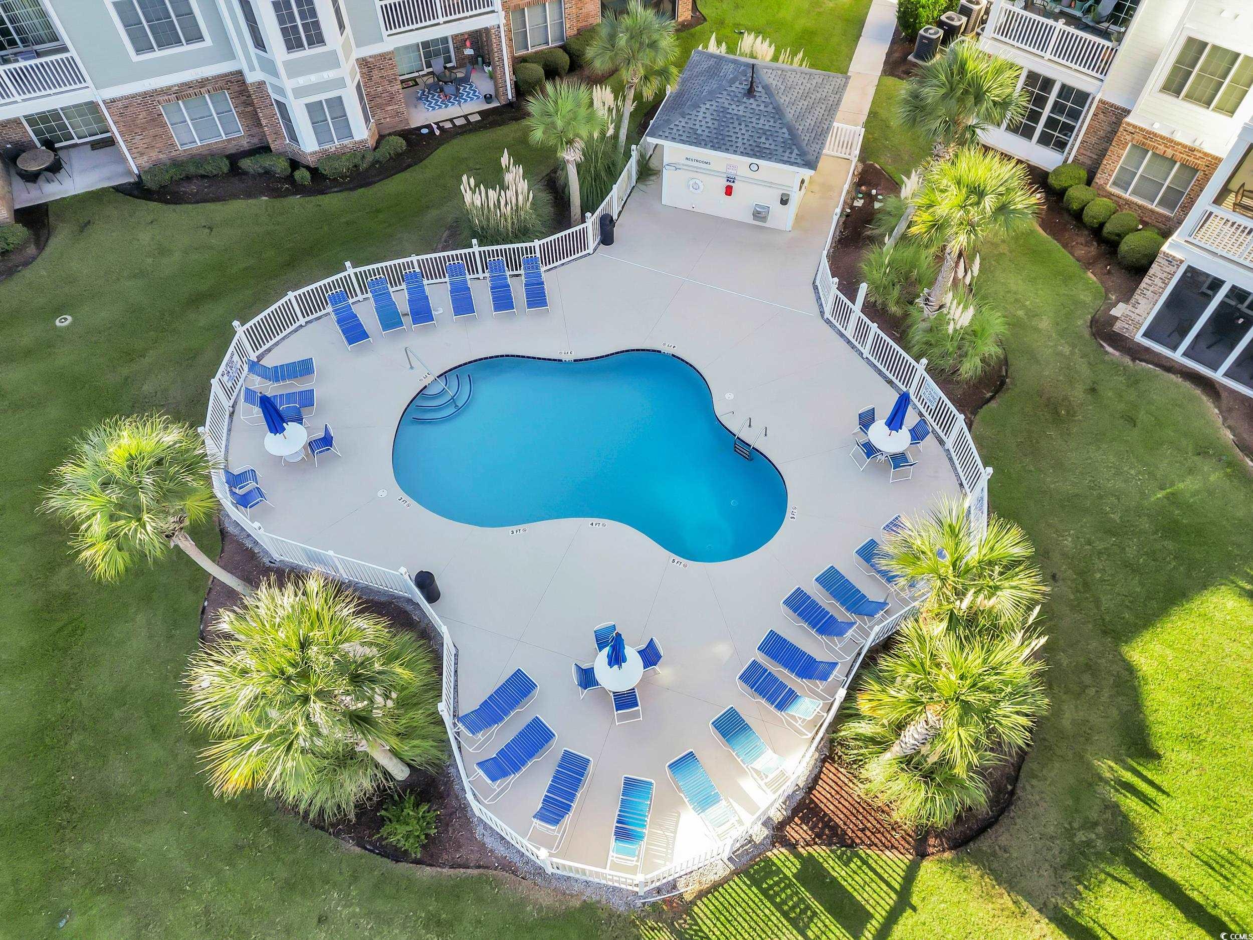 4833 Luster Leaf Circle, Unit 201 Myrtle Beach, SC 29577 - Photo 36 of 39 Aerial view of a pool area