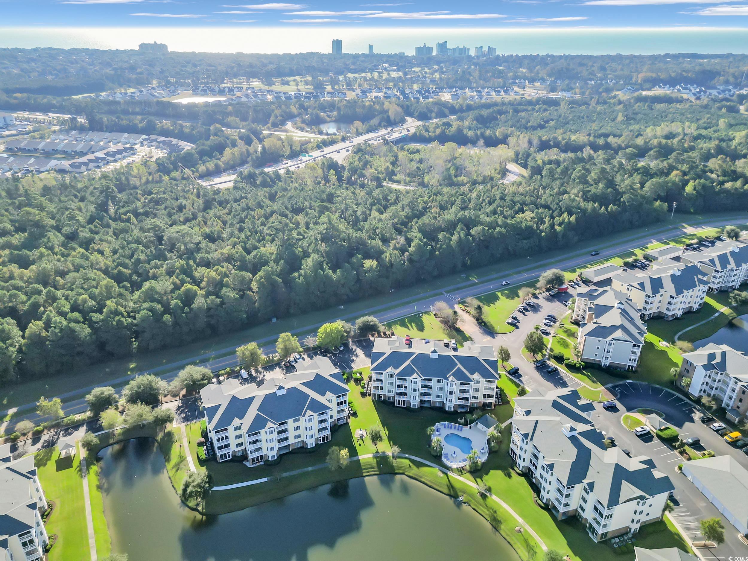 4833 Luster Leaf Circle, Unit 201 Myrtle Beach, SC 29577 - Photo 38 of 39 Drone / aerial view of a large body of water