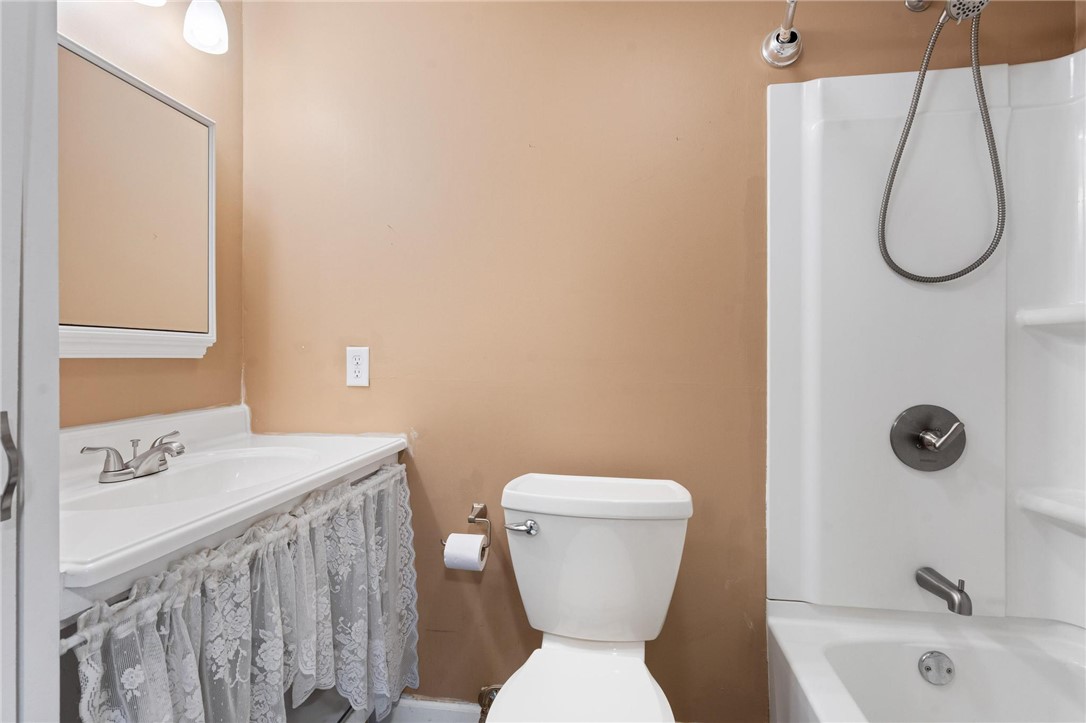 885 Hook Road Xenia, OH 45385 - Photo 18 of 33 This bathroom provides functionality and comfort for daily routines.