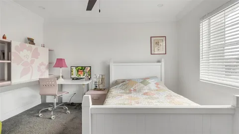 a workspace with furniture and window