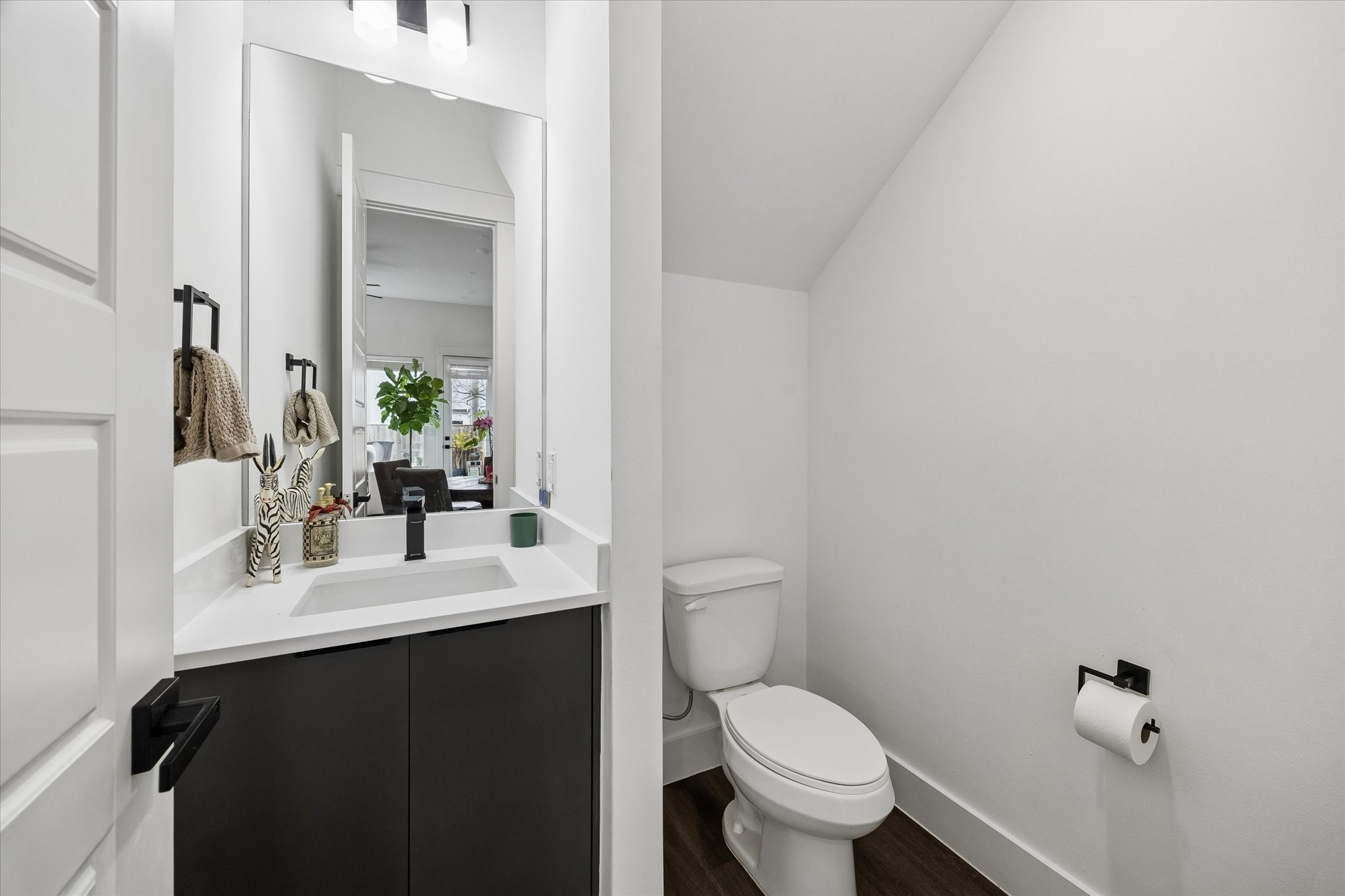 5318 Wunder Lane Houston, TX 77091 - Photo 13 of 25 a bathroom with a sink vanity mirror and toilet