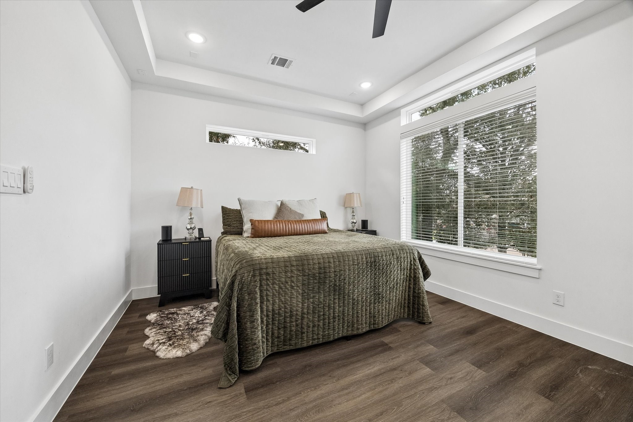 5318 Wunder Lane Houston, TX 77091 - Photo 14 of 25 a bedroom with a bed and wooden floor