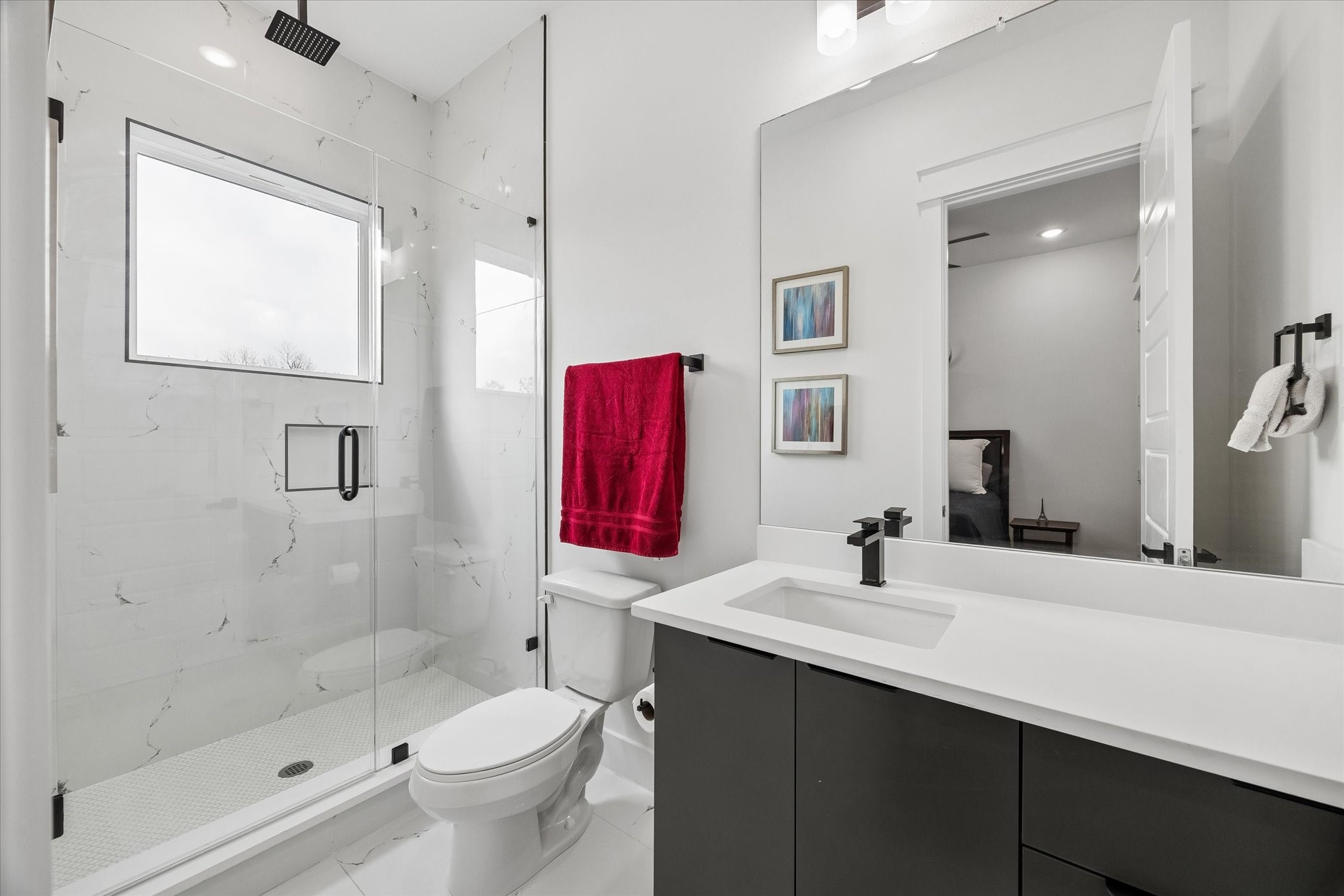 5318 Wunder Lane Houston, TX 77091 - Photo 19 of 25 a bathroom with a sink toilet and shower